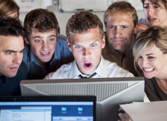 112184013-group-of-people-looking-shocked-at-computer-gettyimages