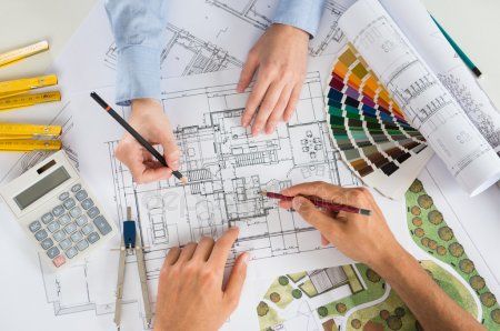 depositphotos_34474389-stock-photo-two-architect-working-together