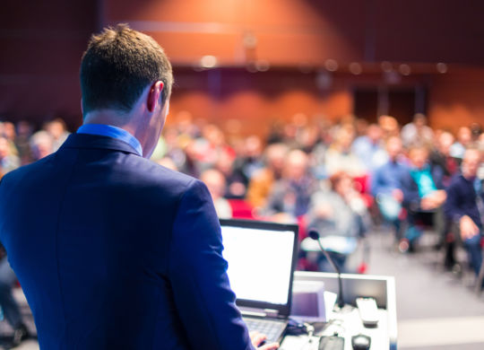 Speaker at Business Conference and Presentation. Audience at the conference hall.